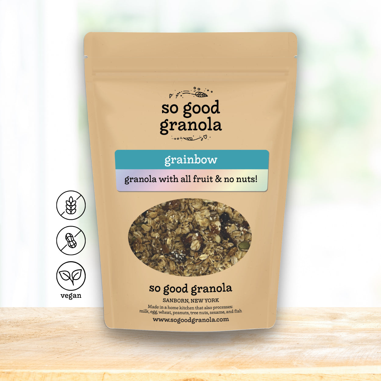 Package of 'so good granola' with a label indicating 'grainbow' flavor on a light background.