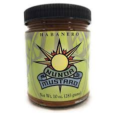 Jar of Mundos Habanero Mustard with green label and black lid.